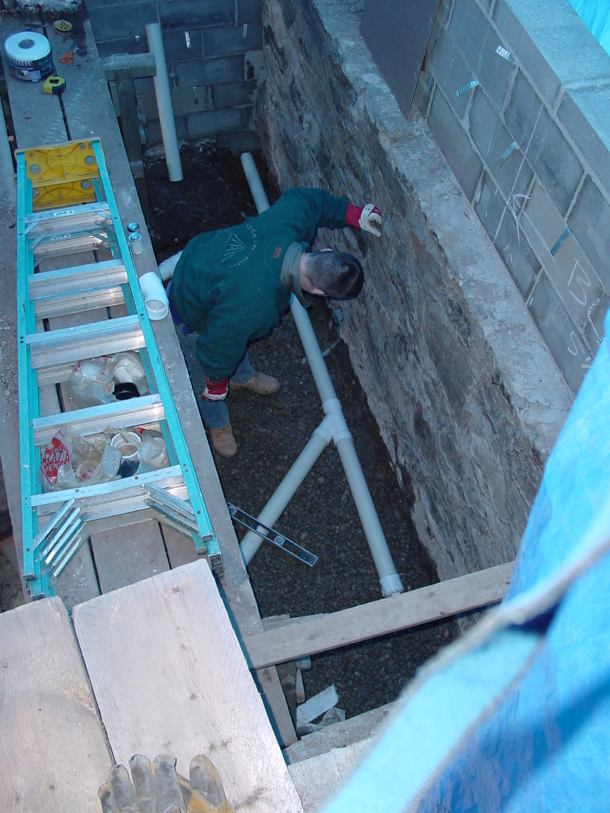 Putting in kitchen floor drainage