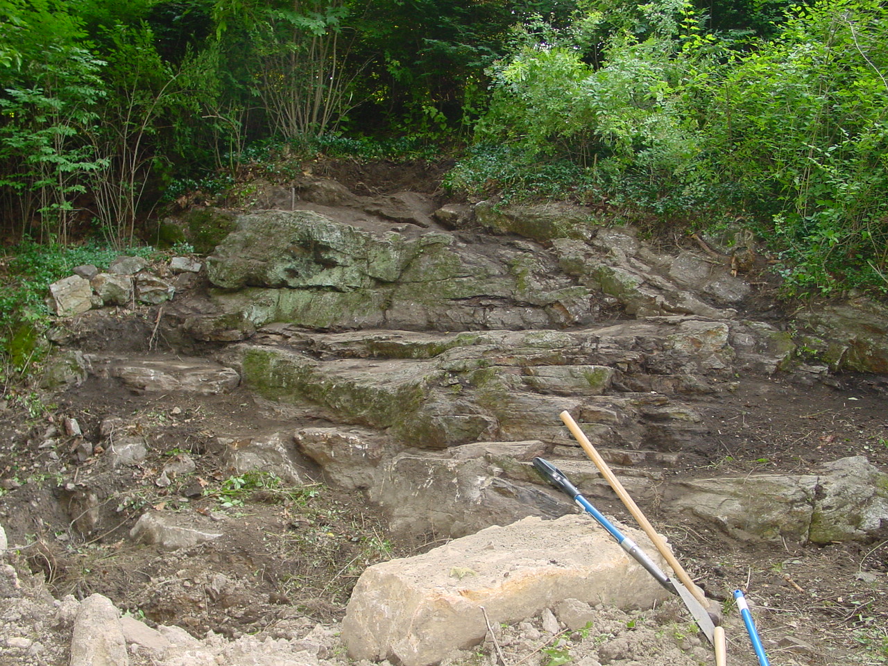 Cleaning the rock outcropping