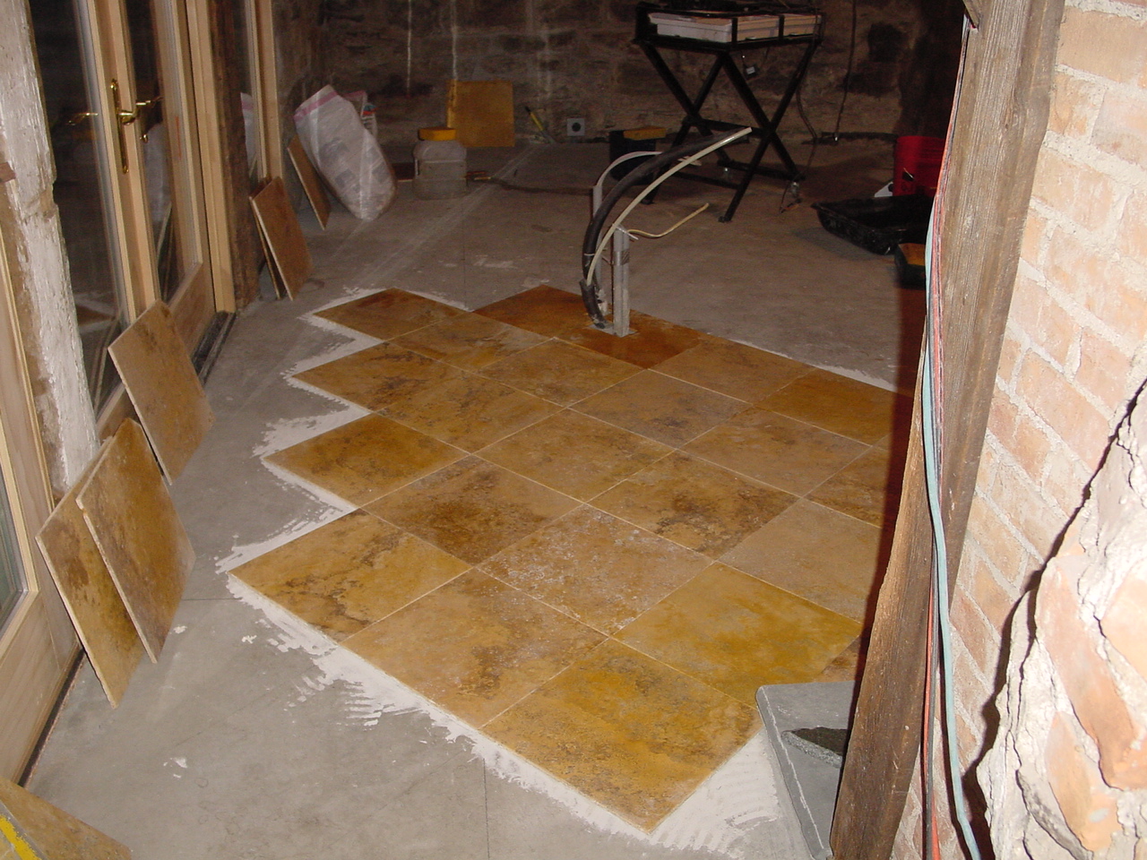 Starting to tile kitchen floor