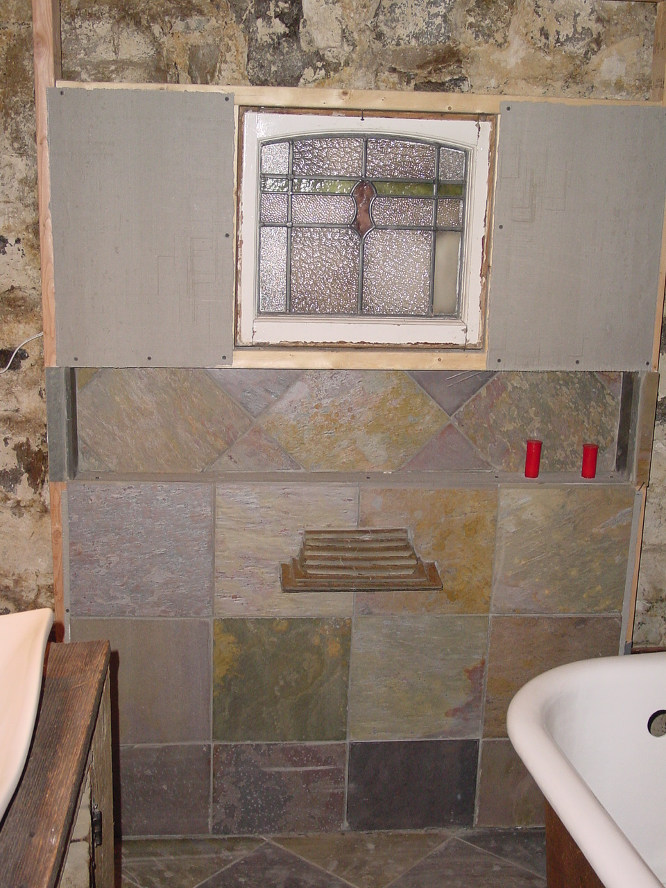 Tile wall work in lower bath
