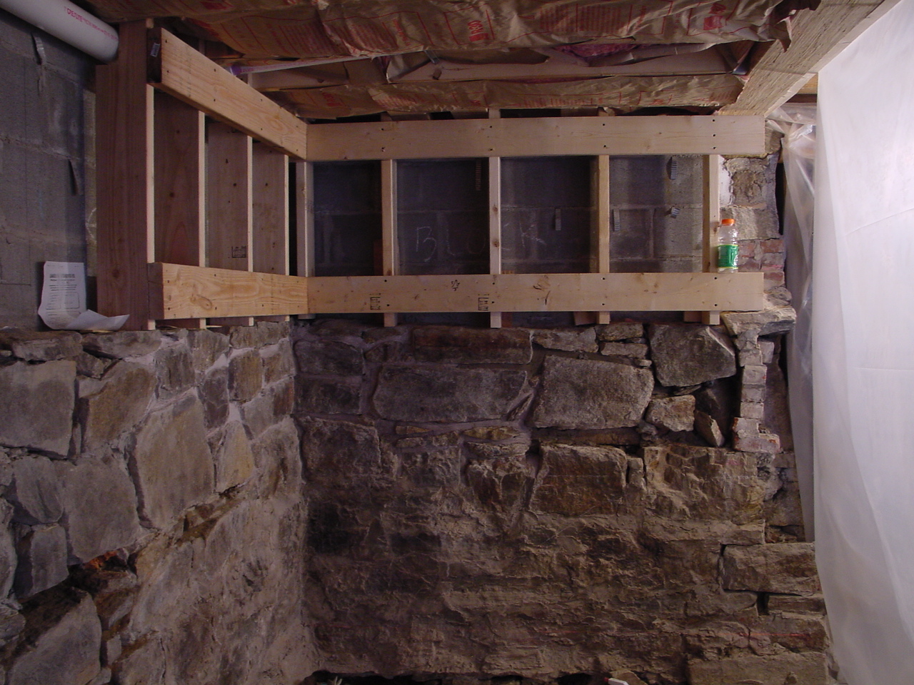 Stone re-work and upper cabinet bracing in kitchen