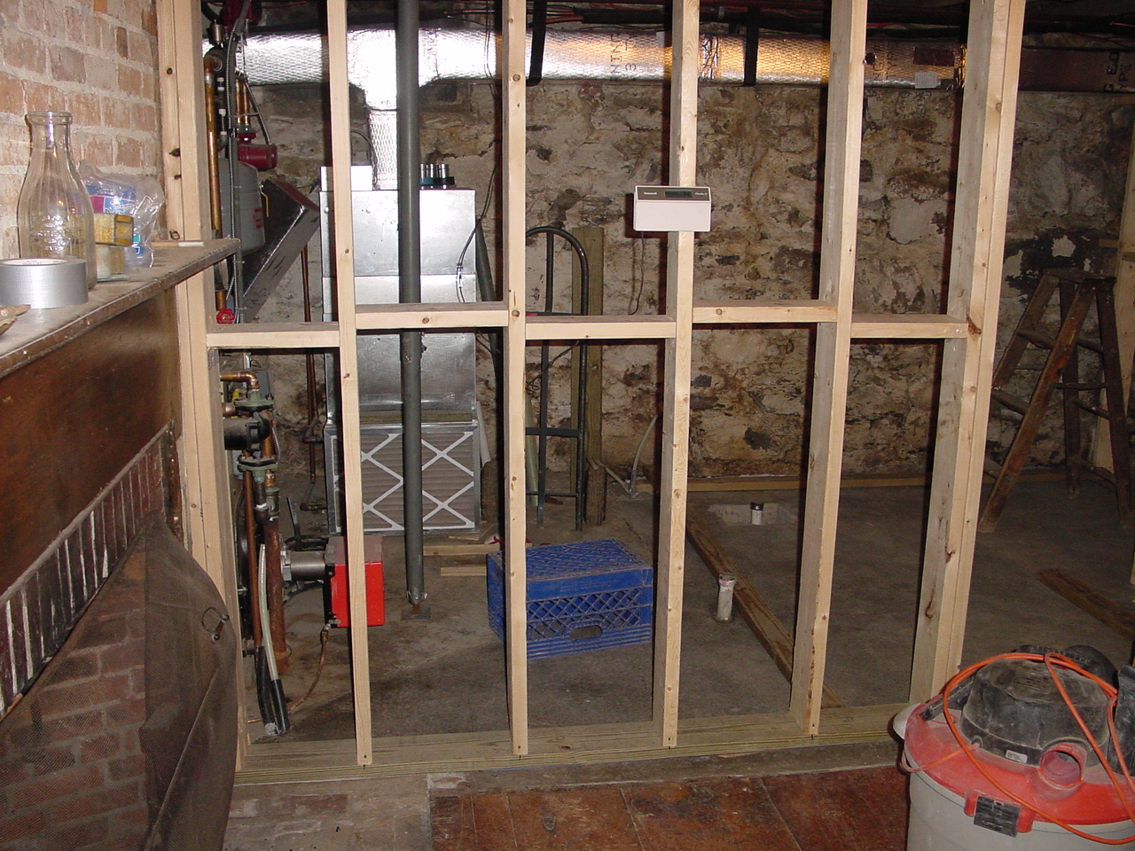 Old door out and framing between tap room and util room